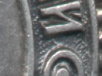 Знак ордена состоял из двух деталей: основа знака и нарезной штифт (винт)